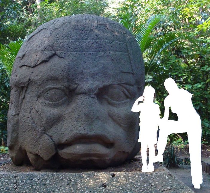 Monument 4 from La Venta with comparative size of an adult and child. The monument weighs almost 20 tons